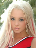Blonde cheerleader shows boobs