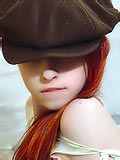Slim redhead showing her nice pussy