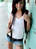 Brunette college girl posing