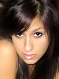 Topless latin gal drops her panties
