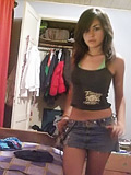 Smiling teenie blowing cock